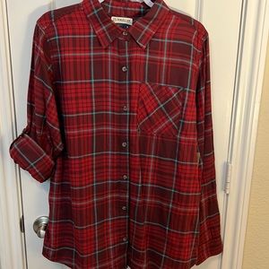 Long sleeve button up shirt. Sleeves can be rolled up or worn down. NWT